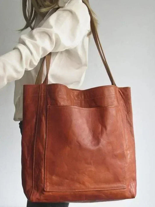Bolso de Mano Encerado Joker