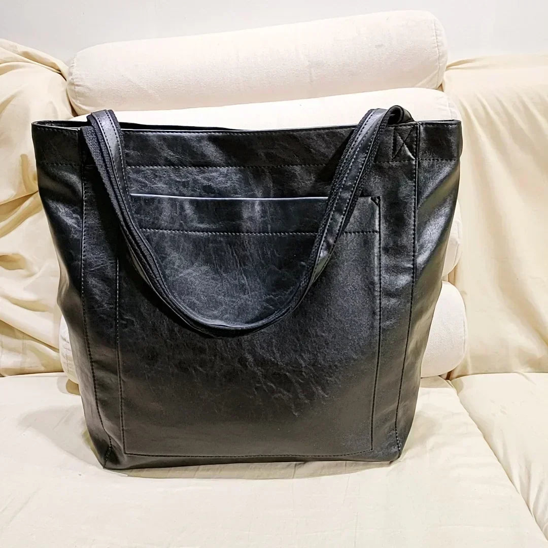 Bolso de Mano Encerado Joker