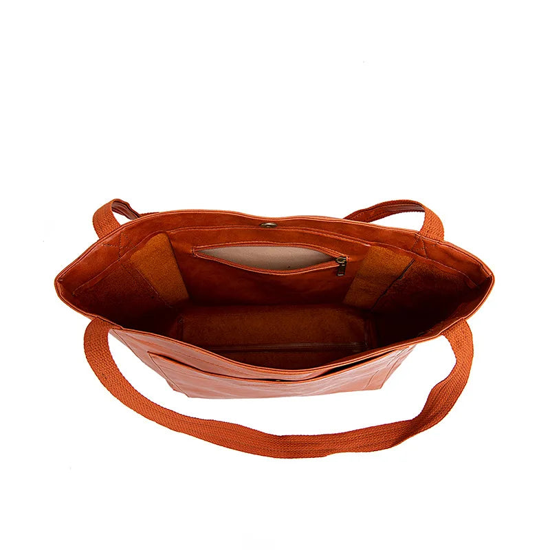 Bolso de Mano Encerado Joker