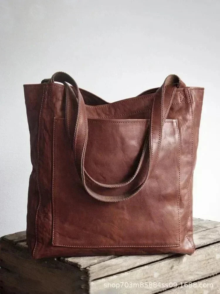 Bolso de Mano Encerado Joker