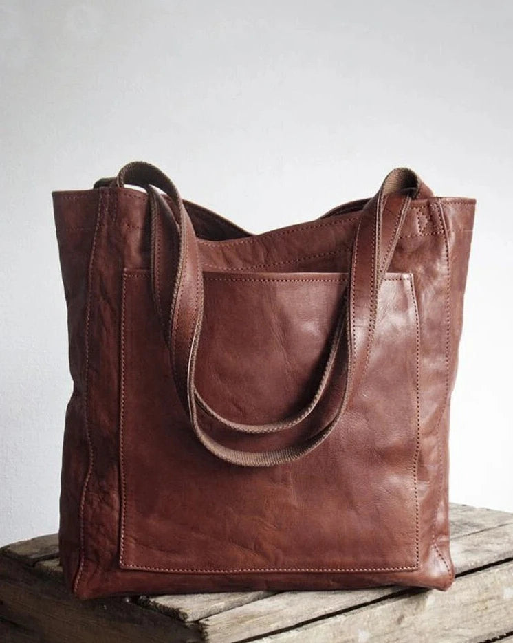 Bolso de Mano Encerado Joker