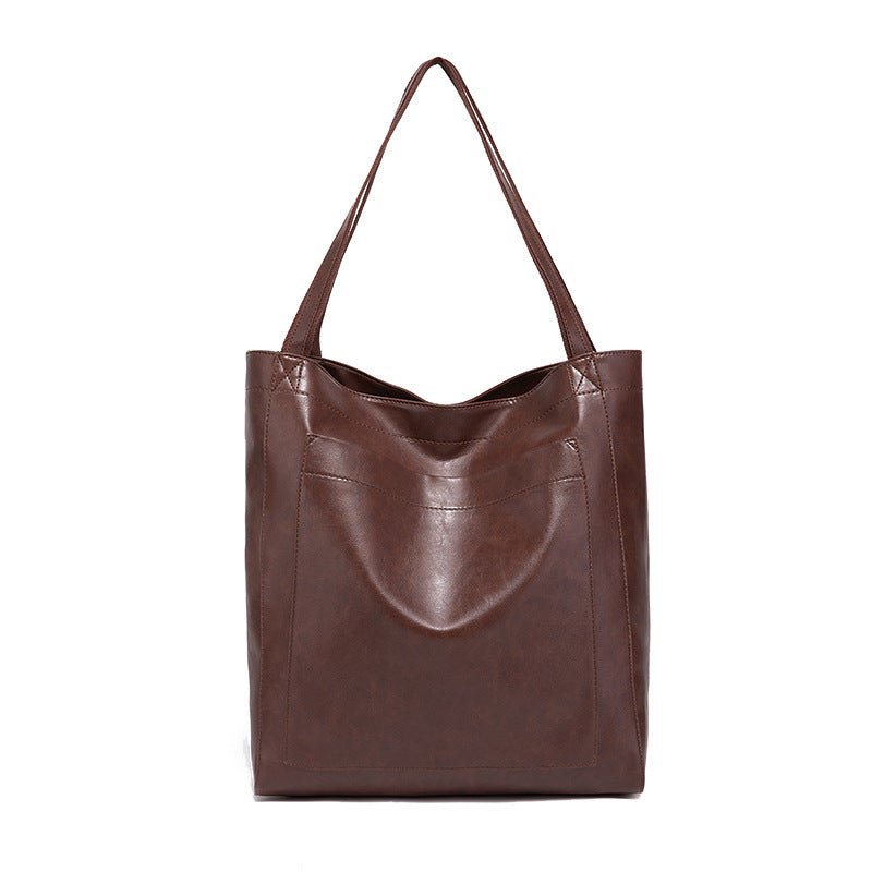 Bolso de Mano Encerado Joker