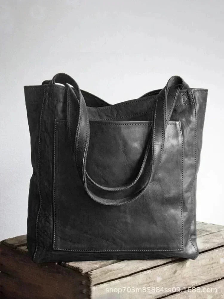 Bolso de Mano Encerado Joker