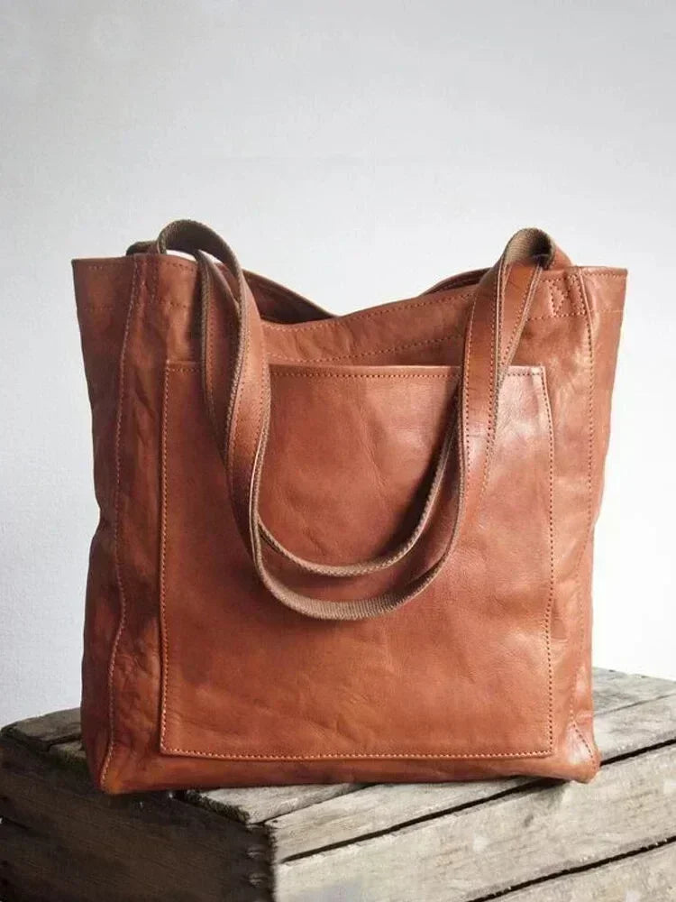 Bolso de Mano Encerado Joker